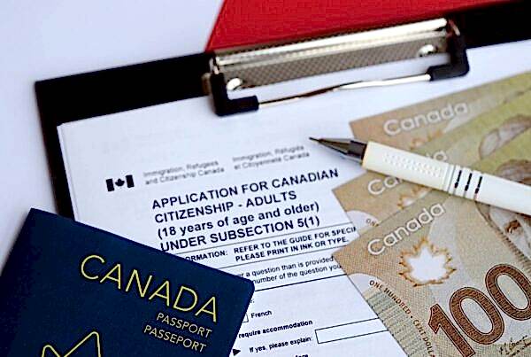 filling out new Canadian application papers